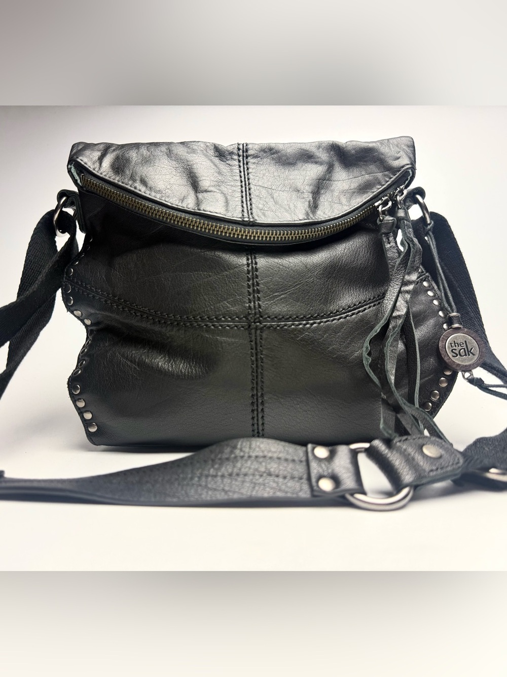 The Sak Black Leather Stud-Accent Crossbody with Tassel Charm